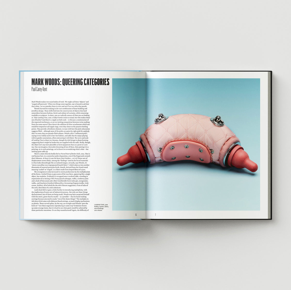 An open magazine shows the article "Formula + Fetish" by Black Dog Press on the left and, on the right, a photo of a pink quilted abstract object with red rubber ends blending jewellery and fine art.