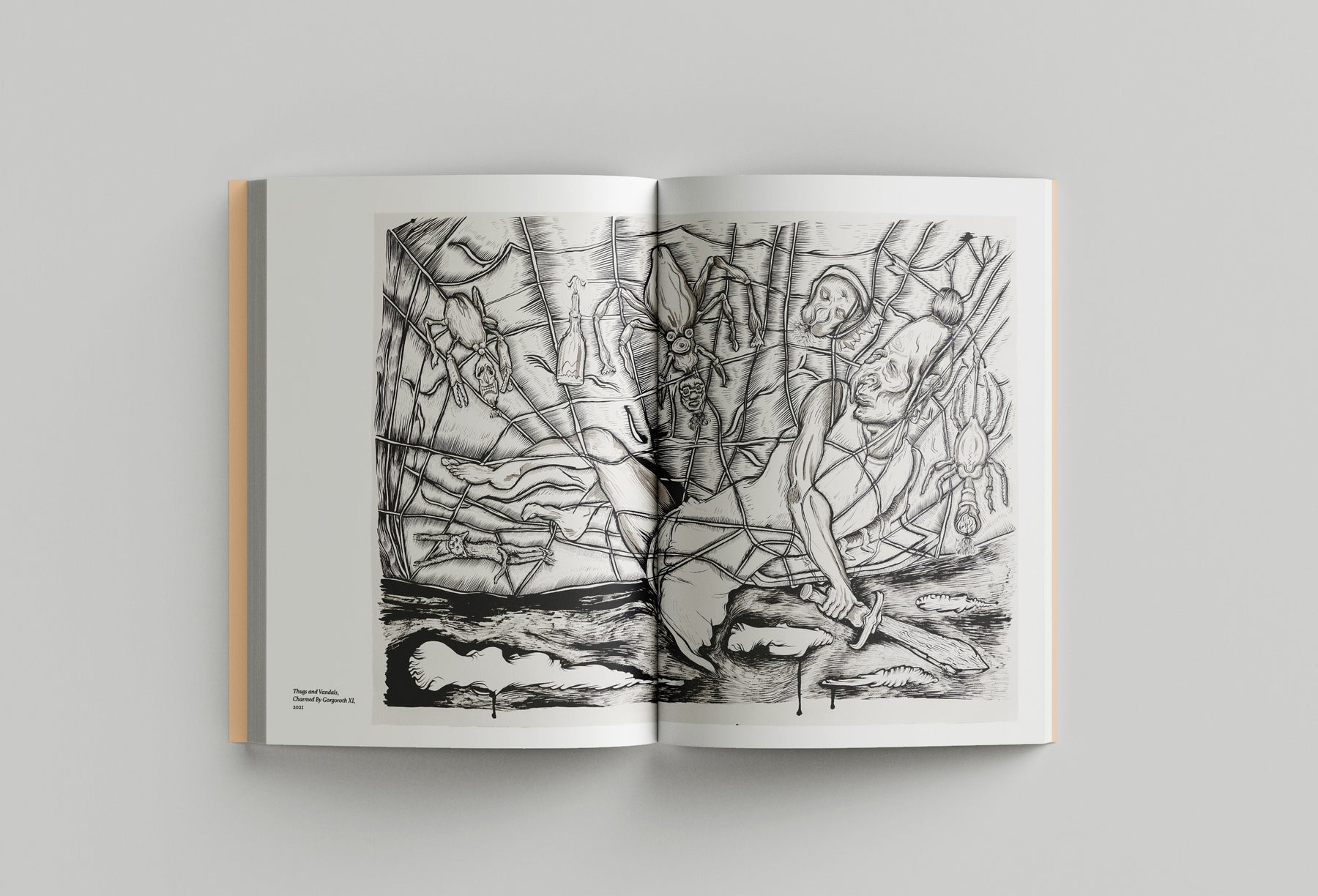 An open book on a neutral background displays a black and white abstract drawing with human figures entangled in a complex scene. The text on the left page reads "Pablo Picasso" and "Le cauchemar." This evocative piece subtly mirrors Black Dog Press's Hardeep Pandhal: Inheritance Quest, bridging cultural migration through art.