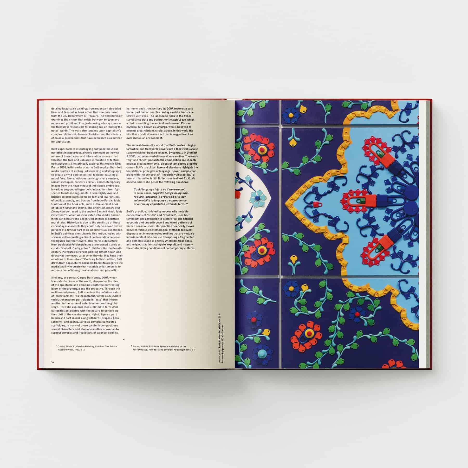 An open book from Black Dog Online's "Ambreen Butt: What Comes to My Lips" displays text on the left page, while the right reveals colorful, intricate tile designs reminiscent of Indo-Persian miniature painting against a plain background.