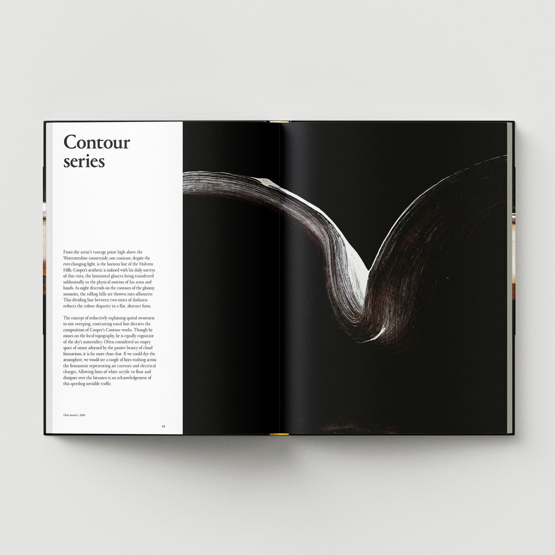 Open magazine displaying a page titled "Johnnie Cooper: The Listener" from Black Dog Online, featuring abstract black and white artwork reminiscent of British abstract artist Johnnie Cooper's expressive style.