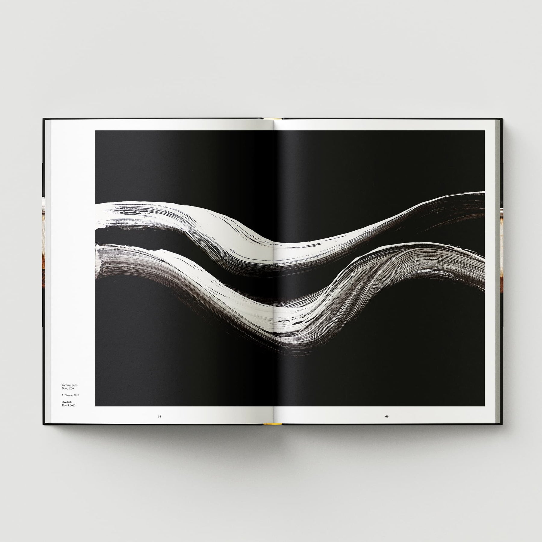 An open book titled "Johnnie Cooper: The Listener" by Black Dog Online showcases abstract black and white brushstrokes across its pages, evoking the style of a renowned British abstract artist, all placed against a minimalist background.