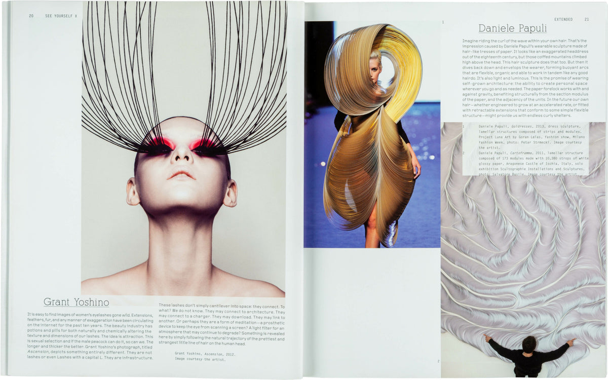A fashion magazine spread features an avant-garde hairstyle with long, upward-extending strands inspired by "See Yourself X: Human Futures Expanded" from Black Dog Online on the left, while a model on the right captivates in a dress that mirrors this flowing design.