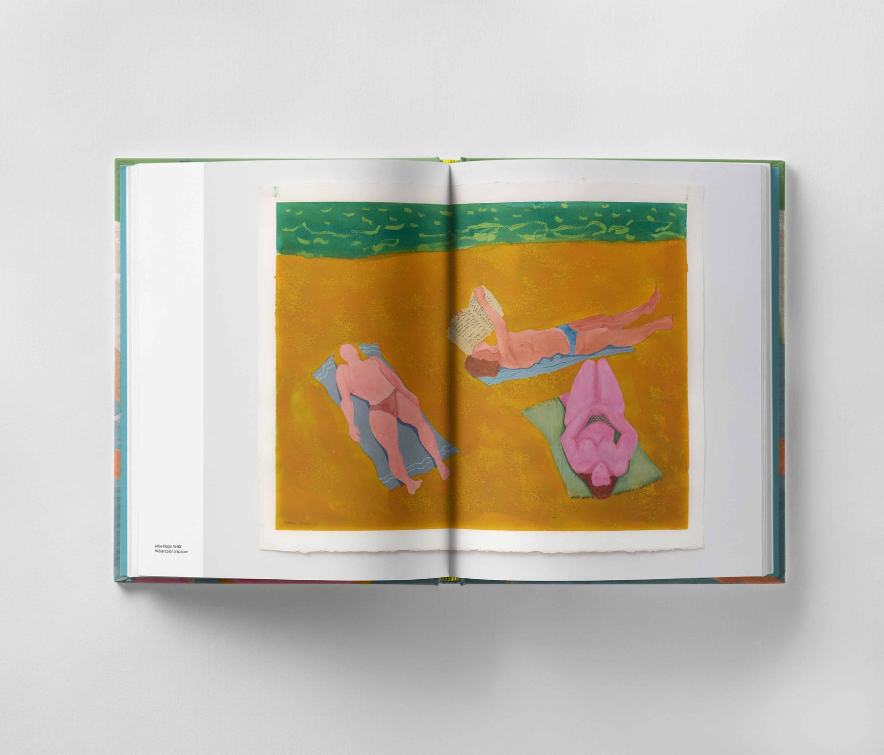 An open book displaying an illustration of three people laying on a beach with bright yellow sand and a blue-green water background, reminiscent of *March Avery: A Life in Color* by Black Dog Online.