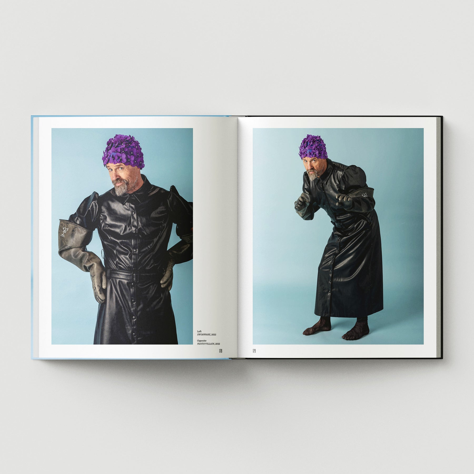Two photos of a man in a black leather coat, purple textured hat, and gloves against a light blue background appear in "Formula + Fetish" by Black Dog Press, showcasing the style of British artist Mark Woods.