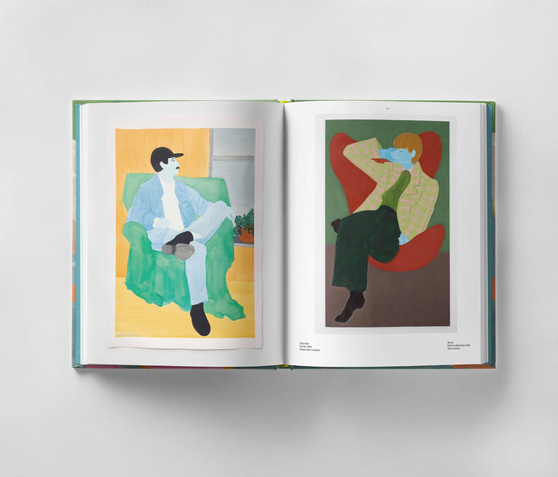 An open book displaying two illustrated pages: one showcases a person in a white outfit sitting on a green chair, capturing emotional depth, while the other reveals a person in a plaid jacket and green shirt sitting on a red chair, reminiscent of the evocative style seen in *March Avery: A Life in Color* by Black Dog Online.