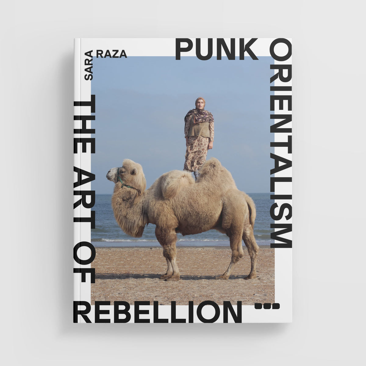 A person stands on a camel at the beach, featured on the cover of a book titled "Punk Orientalism: The Art of Rebellion" by Black Dog Online.