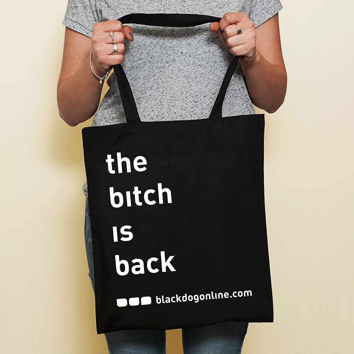 the bitch is back tote bag